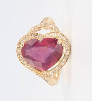 A 14ct yellow gold heart shaped spinel and diamond ring, the centre stone approx.  4.25ct surrounded by brilliant cut diamonds approx. 0.3ct, size M /2