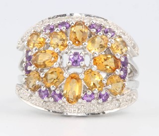 A 14ct white gold dress ring set citrine, pink topaz and diamonds size N 