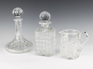 An Edinburgh Crystal water jug 14cm, a spirit decanter and a ships decanter