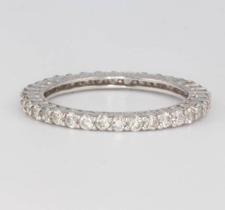 An 18ct white gold eternity ring approx. 0.9ct size 0 1/2 