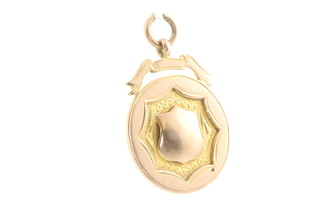 A 9ct yellow gold sports fob, 6.6 grams