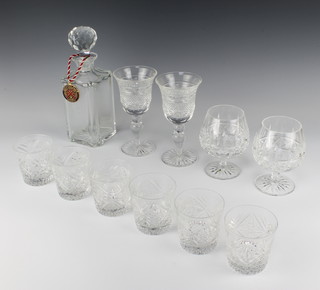 A pair of Waterford Crystal brandies, 6 Edinburgh Crystal tumblers, a pair of Cumbria Crystal wines and a spirit decanter, all boxed