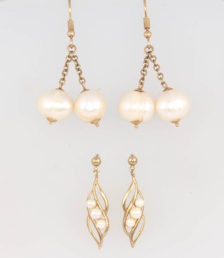 Two pairs of yellow gold pearl earrings 