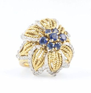 A vintage yellow gold sapphire and diamond floral dress ring size K, gross 14.4 grams