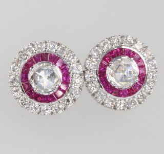 A pair of 18ct white gold diamond and ruby target ear studs, approx 0.4ct each 12mm 
