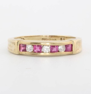 A 9ct yellow gold ruby and diamond ring size M 