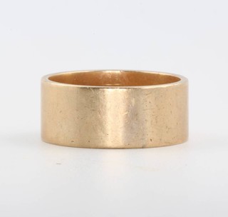 A 9ct yellow gold wide wedding band size Q, 7.3 grams