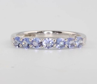 A 9ct white gold gem set ring size Q