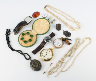 A cased set of Edwardian studs in a green Moroccan leather case and minor costume jewellery 