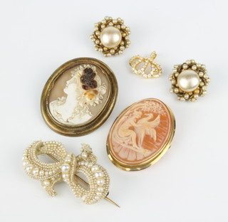 A carved cameo brooch in the form of a classical lady with bird contained in an 18ct yellow gold mount and minor jewellery