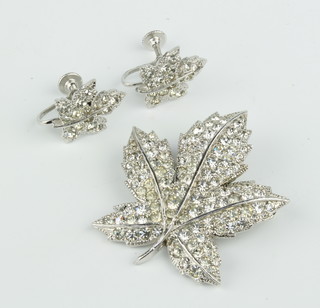 A paste maple leaf brooch and ear clips 
