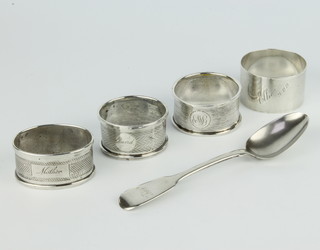 An oval silver napkin ring Birmingham 1947, 2 others and a spoon 104 grams 