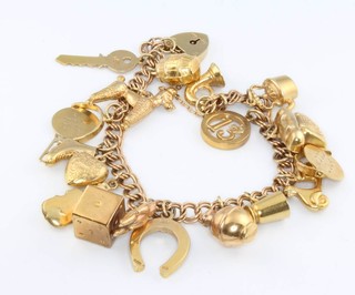 A 9ct yellow gold charm bracelet 23.8 grams 