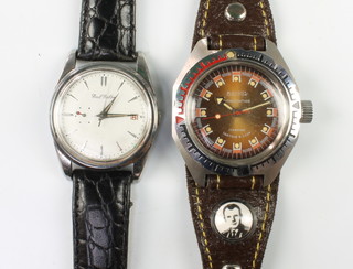 A gentleman's chromium cased Boctok antimagnetic wristwatch on a fabric strap and a Paul Buhre calendar ditto 