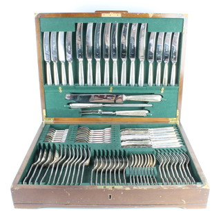 A walnut canteen containing a set of plated fiddle and thread pattern cutlery for 8 comprising 87 pieces 