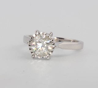 An 18ct white gold illusion set single stone diamond ring approx. 1.3ct, size M 1/2