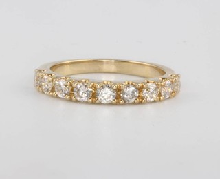 A 9ct yellow gold diamond half eternity ring approx. 0.75ct size L 