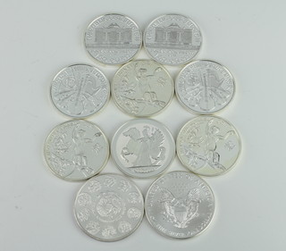 Ten silver commemorative crowns, 10 ozs