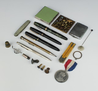 A silver propelling pencil and minor items 
