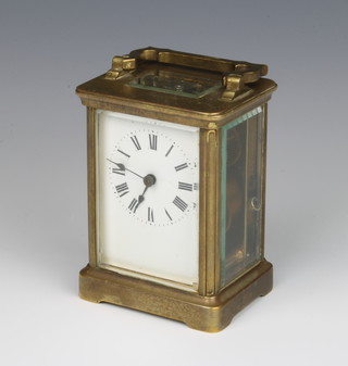 Albert Villon, a French 8 day carriage clock with enamelled dial and Roman numerals contained in a gilt case 10cm x 8cm x 6cm 