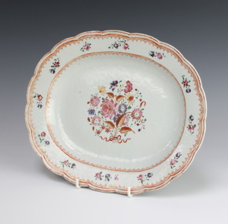 An 18th Century Chinese Export oval meat plate decorated with flowers in a floral border 29cm 