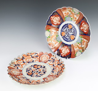 An Imari scallop shaped dish decorated with panels of birds and flowers 31cm, a do. 31cm