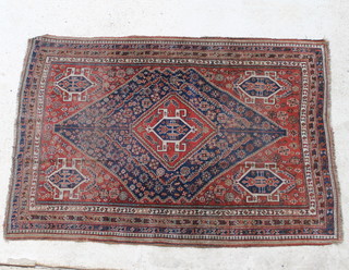 A Persian blue and brown ground Qashqai rug  197cm x 139cm 