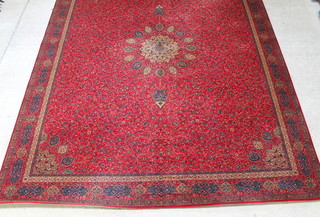 A Wilton Grosvenor red and blue ground Persian style carpet with central medallion 457cm x 365cm 