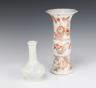 A Chinese Ghu vase the ochre decoration with birds amongst flowers 25cm and a provincial white glazed baluster vase decorated with insects and flowers 14cm 
