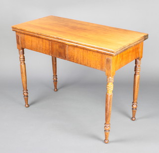 A Victorian rectangular mahogany tea table, raised on turned supports 74cm h x 96cm w x 46cm d 