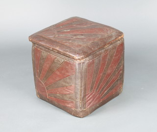 A square Art Deco ottoman with hinged lid, covered in leather material with sunburst decoration 36cm x 37cm x 36cm 