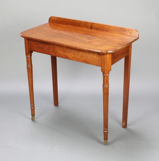 A Victorian mahogany side/serving table with raised back on turned supports 77cm h x 76cm w x 40cm d 