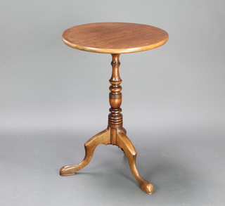 A Georgian style circular oak wine table, raised on a turned column and tripod base 71cm h x 49cm diam. 