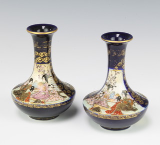 A pair of early 20th Century Satsuma oviform vases with blue ground and waisted necks decorated with panels of figures in gardens 11cm 