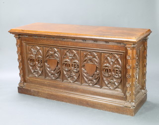 A Victorian carved oak leaf bearing sideboard with oval panels to the front fitted cupboards to the ends 92cm h x 174cm w x 58cm d (formerly the property of Lord Ryder Cootes)