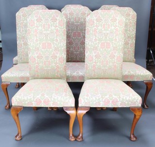 A set of 8 Queen Anne style high back dining chairs raised on cabriole supports with upholstered seats and backs 
