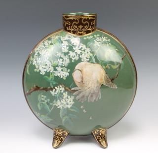 A Doulton Lambeth Faience moonflask, the green ground with a bird amongst flowers on scroll feet, impressed and printed marks 34cm 