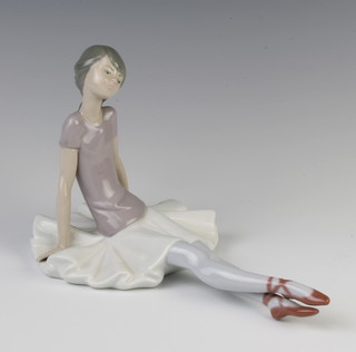 A Lladro figure of a seated ballerina 1356 25cm 