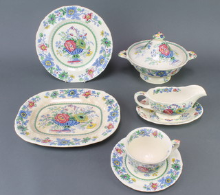 A Masons Ironstone Strathmore pattern part tea and dinner service comprising 8 tea cups (3 af), 2 small tea cups (both af) 5 small saucers, 5 large saucers (1af), 6 small plates (1af), 6 medium plates (3af), 6 side plates, 6 dinner plates, 3 soup bowls, 2 tureen lids, 1 meat plate, a sauce boat and stand, slop bowl, 2 tureen bases (af), a milk jug (af) 2 bowls (af) and a meat plate (af) 