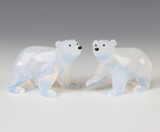 A Swarovski Crystal group of 2 Polar Bear cubs in white opalescent crystal by Anton Herzinger 1080774/9100000310 2011, 7cm boxed