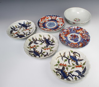 Three Imari style fluted plates 22cm, a famille rose bowl and 2 Imari dishes 