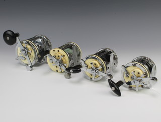 A Mitchell 624 sea multiplier fishing reel together with 3 other Mitchell fishing reels from the 600 series of boat and beach reels