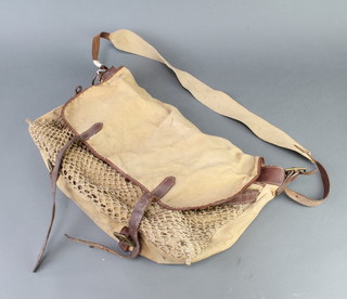 A 1940's Hardy Brothers canvas and leather trout bag with netting front and removable lining 34cm x 43cm x 10cm 