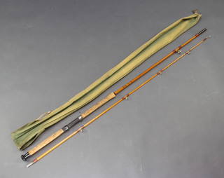 A Hardy Brothers Neocate Glencairn split cane spinning fishing rod in green canvas bag 