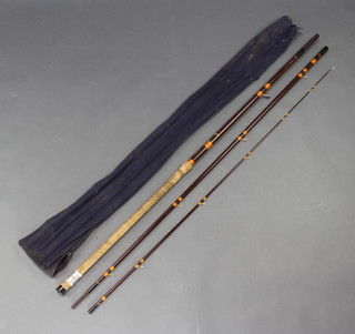 A Hardy Brothers 13' Matchmaker float fishing rod contained in a blue cloth bag 