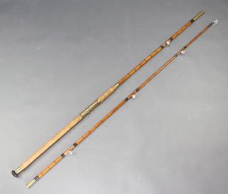 A split cane heavy duty game fishing rod  marked Yarmen 