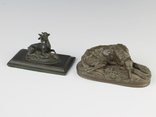 A 19th Century bronze paperweight in the form of a seated deer raised on a rectangular base 5cm h x 13cm w x 6cm d together with a bronzed figure group of a sleeping hound on an oval base 14cm 