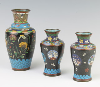 A 19th Century club shaped cloisonne enamelled vase 15cm together with a pair of cloisonne enamelled vase 10cm 
