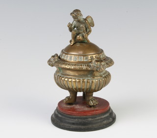 A Regency gilt metal inkwell in the form of a classical urn, the finial in the form of a seated cherub raised on a marble base 13cm h x 8cm 