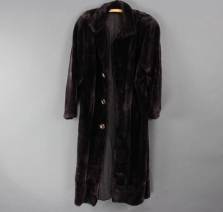 A lady's full length black beaver lamb jacket 